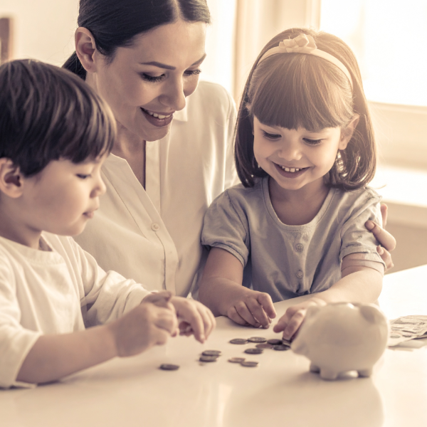 A thoughtful image of a parent and child sitting together reviewing money calmly.. reflective tone, no shame.